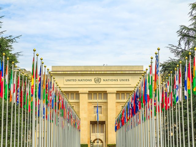 geneva-switzerland-aug-16-2020-row-of-flags-at-entrance-of