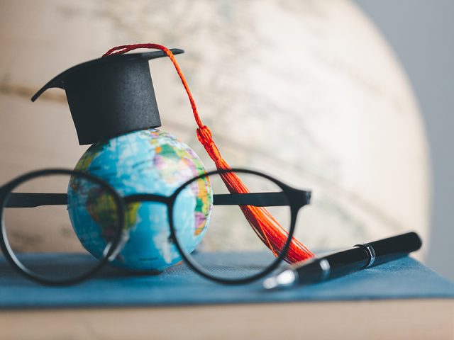 graduation-cap-with-earth-globe-concept-of-global-business-stud