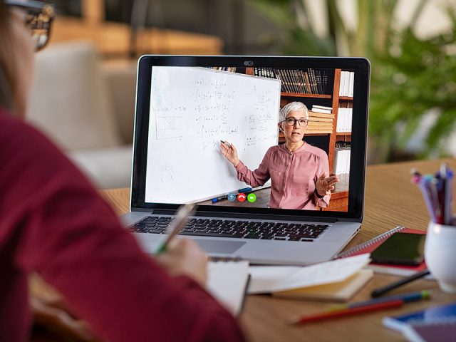 young-student-watching-lesson-online-and-studying-from-home-you